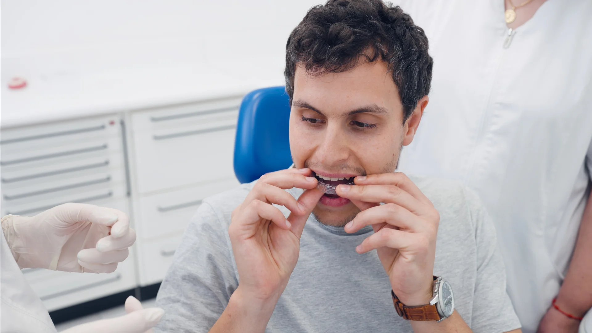 A patient being fitted with a custom oral appliance at Anamosa Dental Associates