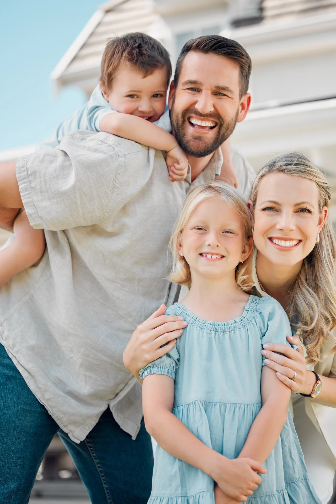An Anamosa family outside their home