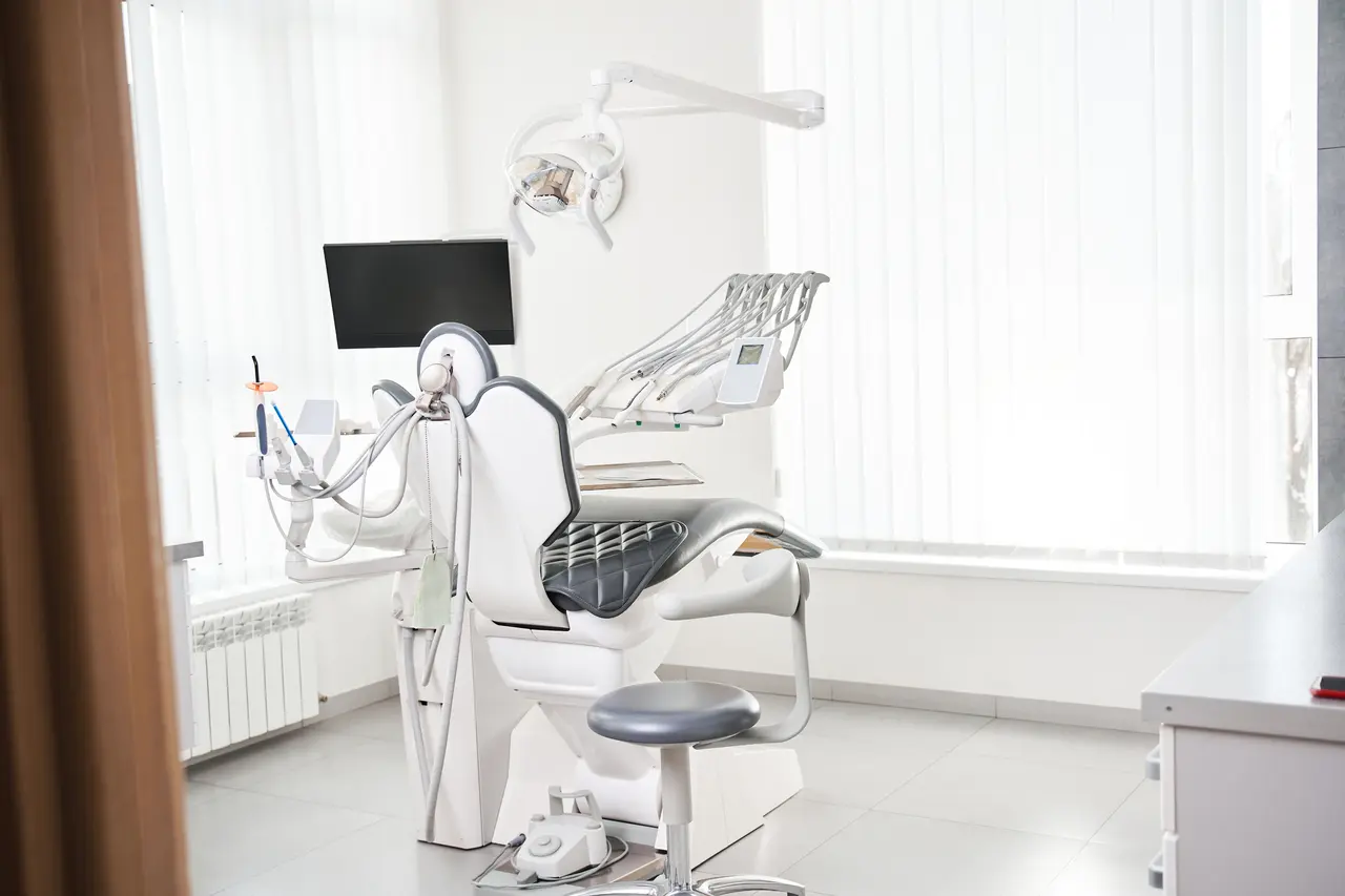An open, accessible dental treatment room with space to manoeuvre