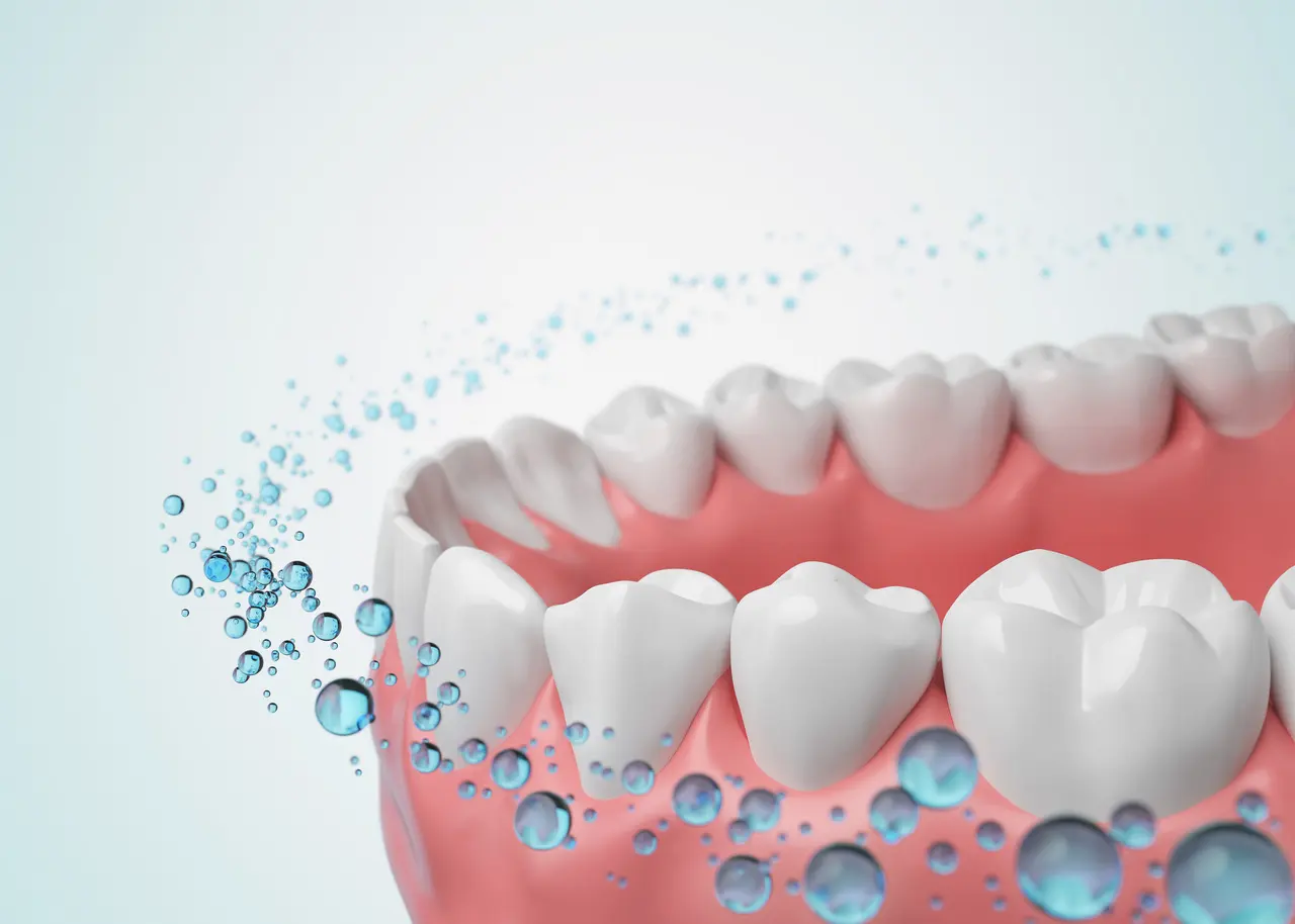 An illustration of fluoride protecting tooth enamel